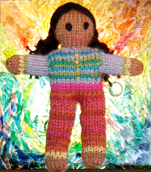 Image of Girl version of Globe Toddlers (tm) Hand-knit Little People by Jutta Distler.